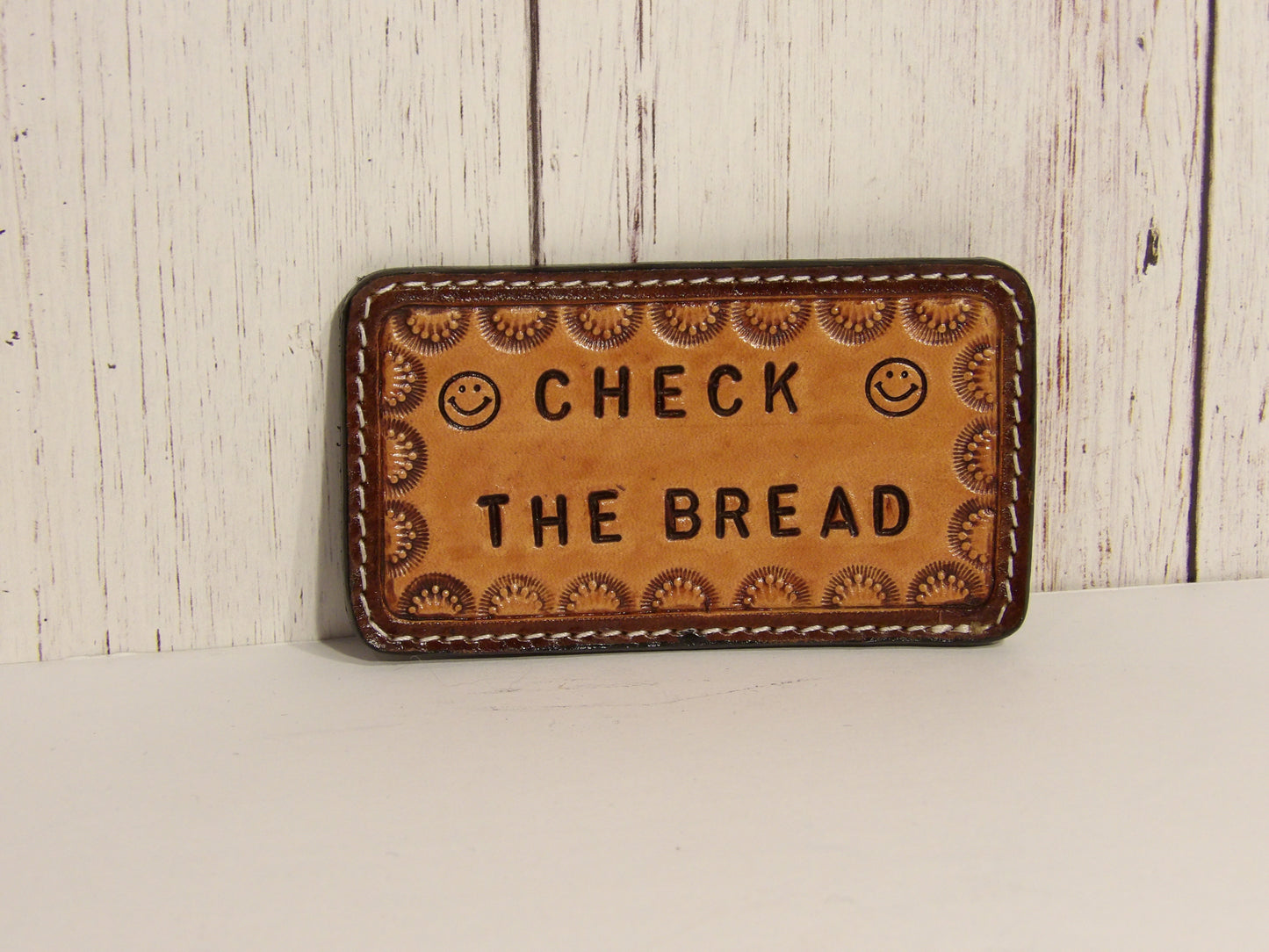 Leather magnet reminders ( check the bread )